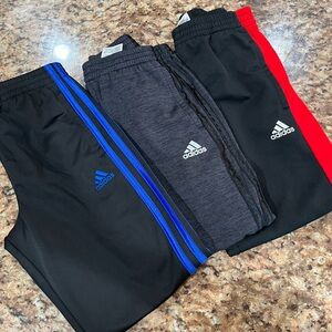 Lot of three pairs of boys, Adidas pants size 7.
